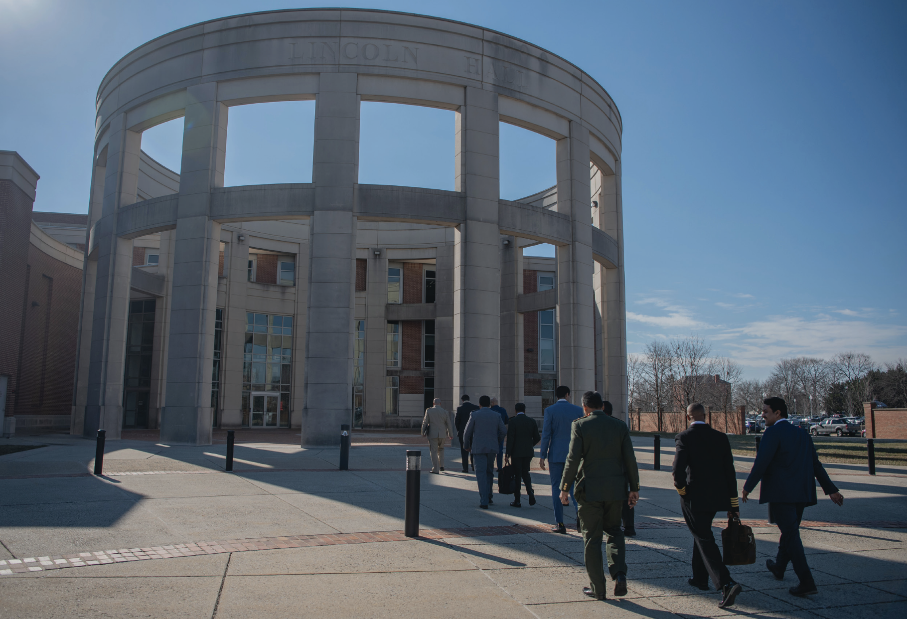 College of International Security Affairs Class of 2023 students walk into Abraham Lincoln Hall, National Defense University, February 1, 2023(CISA/Catherine Nguyen)